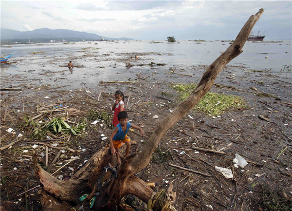 Philippine death toll from typhoon Rammasun rises to 64