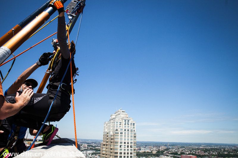 Rappellers go over the edge for charity