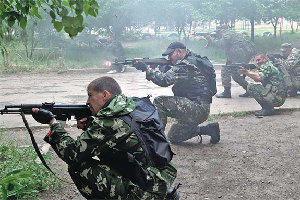 Smoke rises during clashes in Kiev