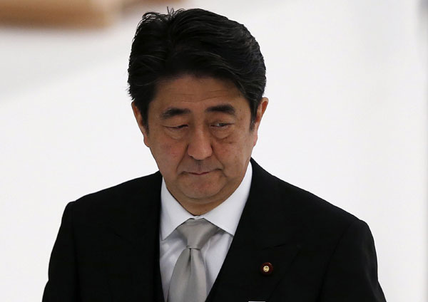 Abe skips renouncing war when marking Japan's surrender