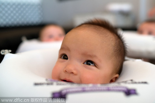 Babies bob about in water at US's first baby spa