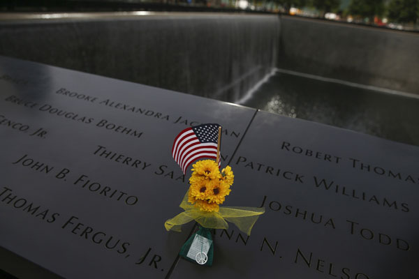 Americans mark the 13th anniversary of the 9/11 attacks