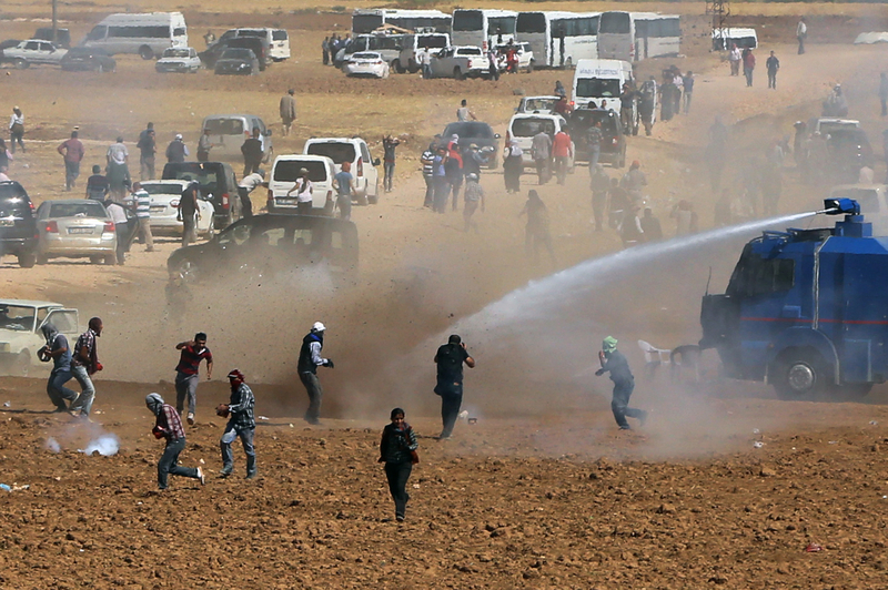 Turkish security forces clash with Kurdish demonstrators