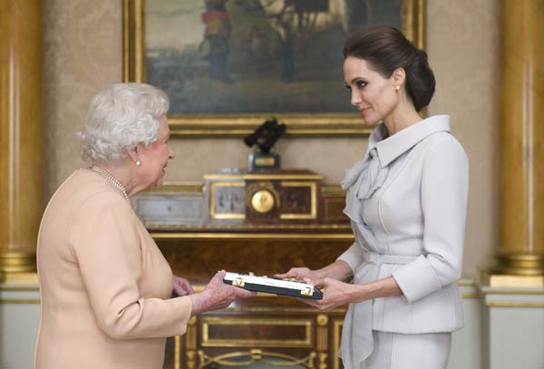 Britain's Queen Elizabeth makes actress Angelina Jolie a Dame