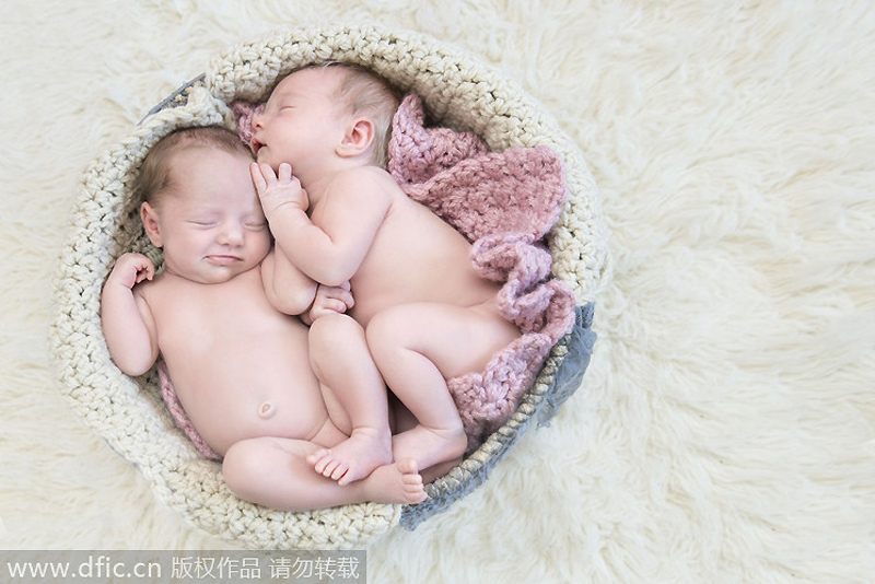 Sleeping newborns photographed in adorable poses