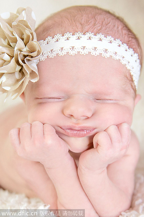 Sleeping newborns photographed in adorable poses