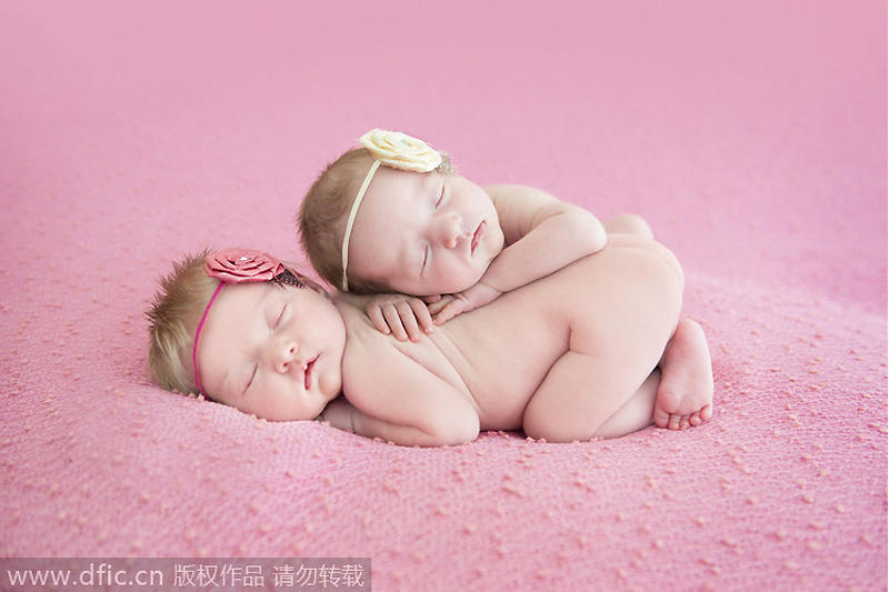 Sleeping newborns photographed in adorable poses