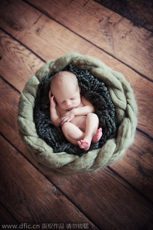 Sleeping newborns photographed in adorable poses