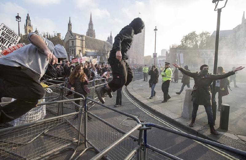 Protest against university tuition turns violent in London