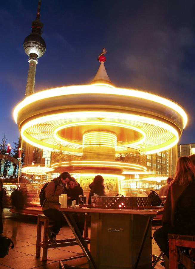 People visit Christmas market in Berlin