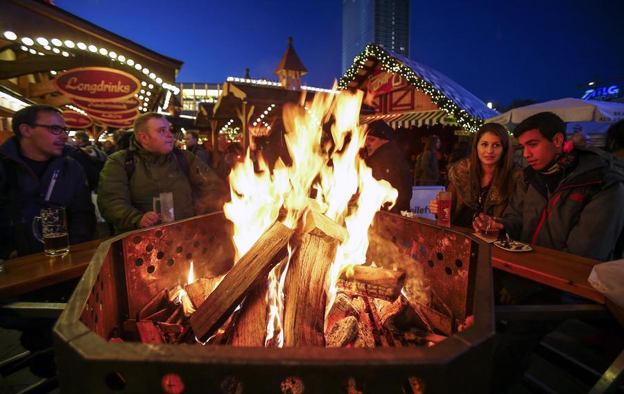 People visit Christmas market in Berlin