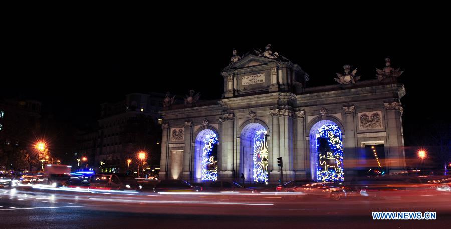 Street illuminated by Christmas lights in Madrid