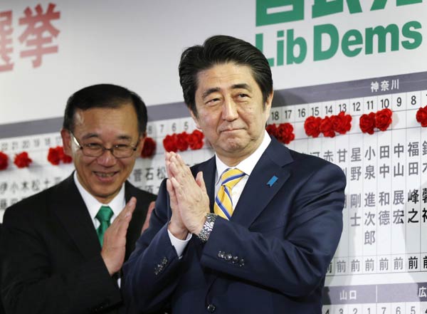 Abe coalition secures big Japan election win with record low turnout