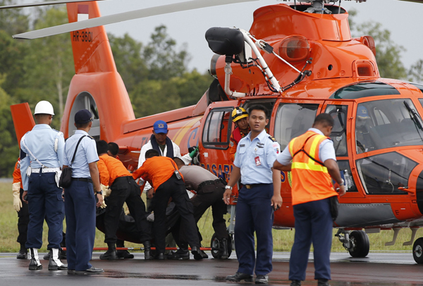 3 more bodies delivered to AirAsia search center
