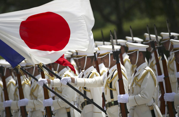 Japan unveils record defense budget