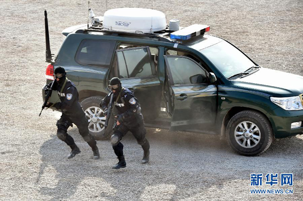Riot police hone skills before heading for peacekeeping mission
