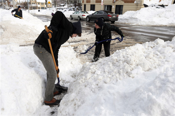 US Northeast digs out from latest winter storm