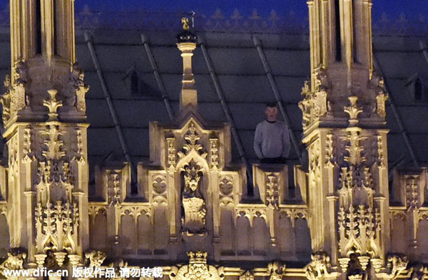 UK police detain trespasser who climbed to Parliament's roof