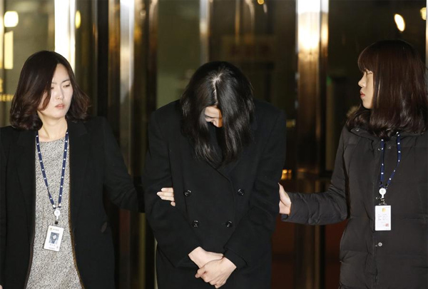Korean Air flight attendant sues chairman's daughter