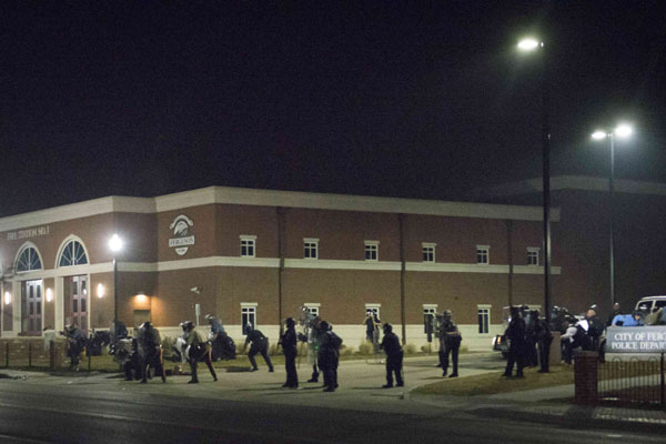 Two officers shot outside Ferguson police department