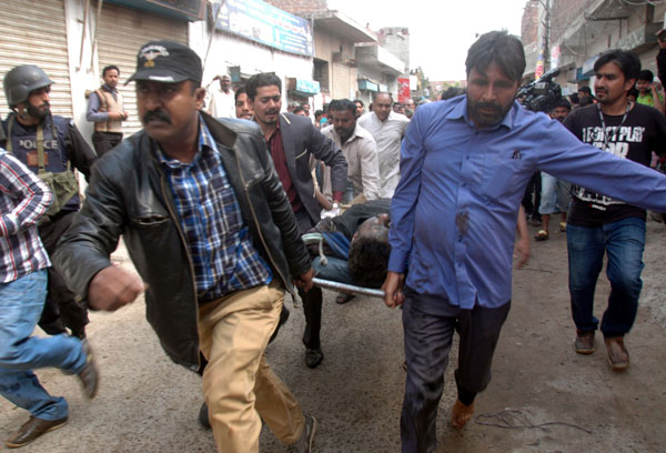 Twin bombings at churches in Pakistan kill 14, wound 78