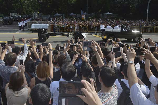 Singapore's founding PM Lee Kuan Yew's casket transferred to Parliament House