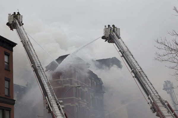 New York fire, building collapse injure 12