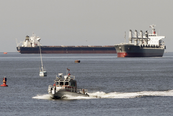 Canadian crews work to contain fuel spill in Vancouver bay