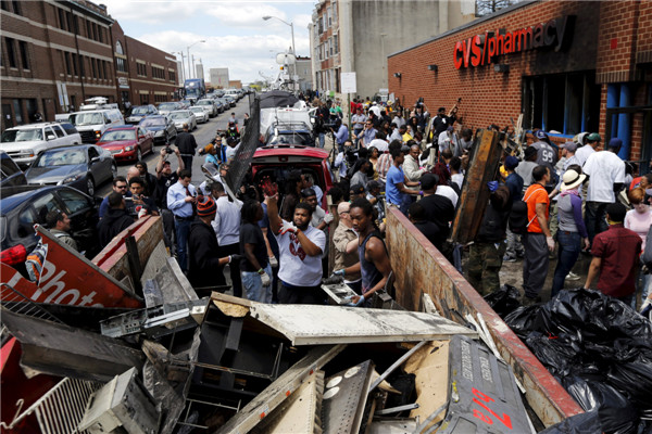 Police descend on Baltimore to enforce curfew after riots