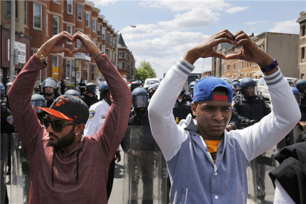 Police descend on Baltimore to enforce curfew after riots