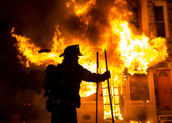 Police descend on Baltimore to enforce curfew after riots