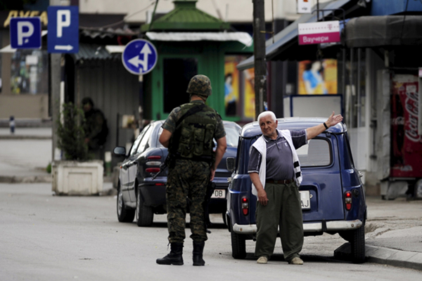 Eight police officers, 14 gunmen killed in Macedonia clashes