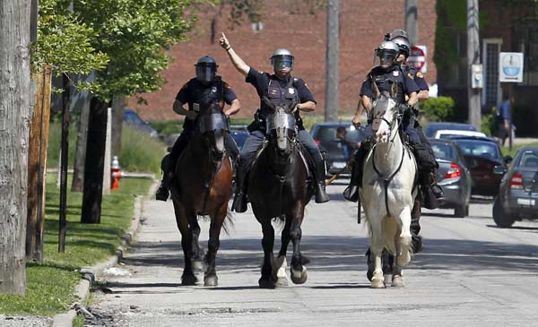 Cleveland, US Justice Department announce police settlement