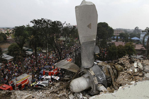 Military plane crashes into residential area in Indonesia