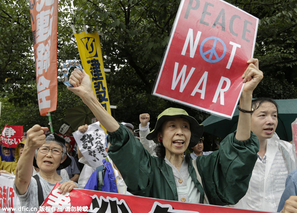 Demonstrators protest against Abe's security bills