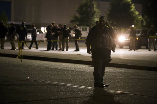 Gunman opens fire at US theater, kills 2, injures 7