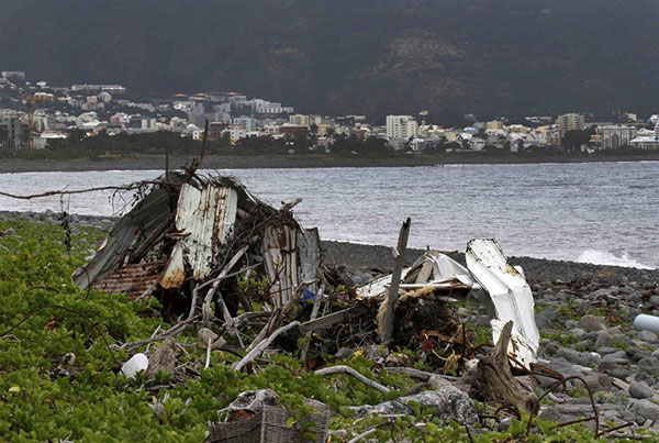 Malaysia confirms wing part washed up on La Reunion coast is from missing MH-370