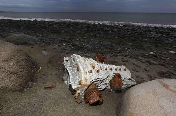 Malaysia confirms wing part washed up on La Reunion coast is from missing MH-370