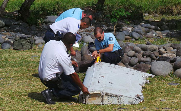 Malaysia confirms wing part washed up on La Reunion coast is from missing MH-370