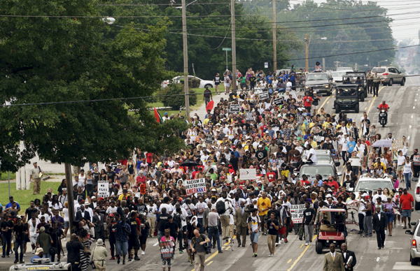 Gunshots heard as Ferguson protests turn violent