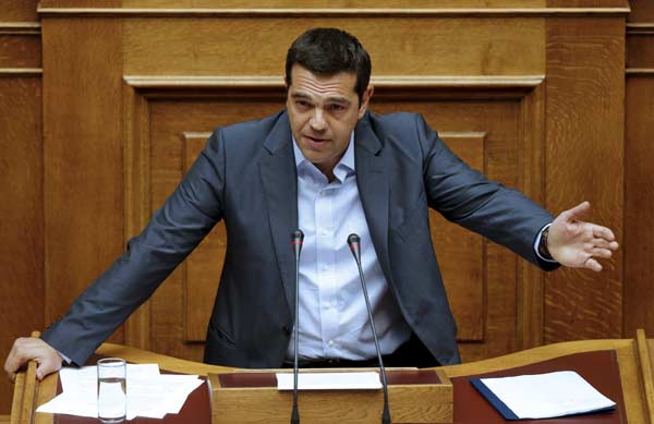 Greek government secures votes to pass bailout in parliament
