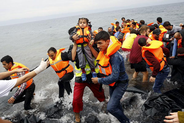 EU backs refugee plan in teeth of east European opposition