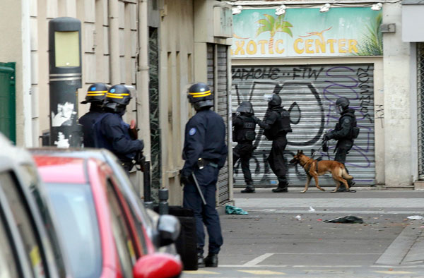 Two die in police raid targetting suspected Paris attack mastermind