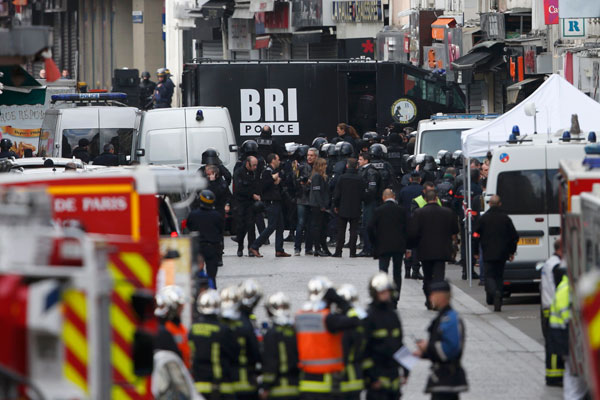 Two die in police raid targetting suspected Paris attack mastermind