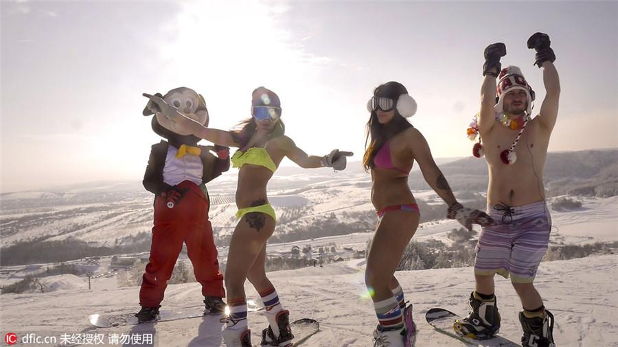 Bikini-clad Russian babes hit ski slopes