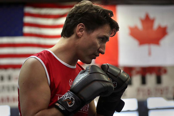 Canadian PM Trudeau slips from political ring to boxing ring