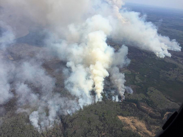 Epic wildfire threatens to engulf Canadian city as 88,000 flee