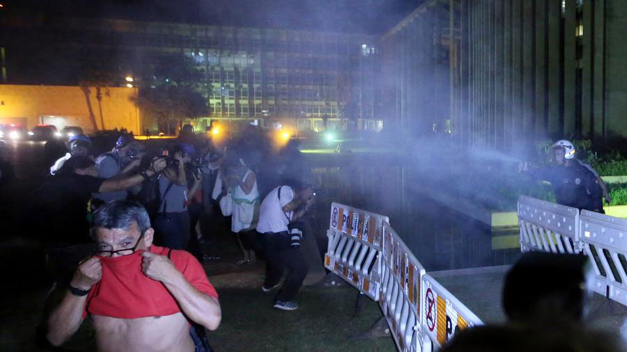 Supporters of Brazil's Rousseff clash with police as her removal looms