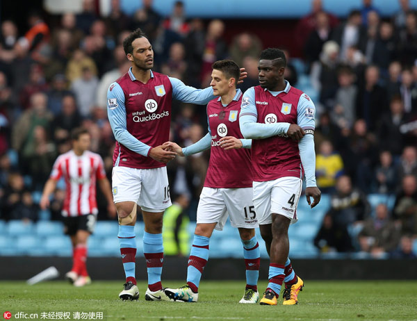 Chinese businessman buys English soccer club Aston Villa