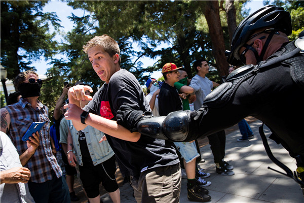 Clash at California capitol leaves at least 10 injured